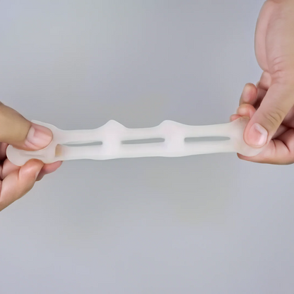 Belro orthopedic hammer toe splint for toe correction, shown on a foot in a health and beauty setting.
