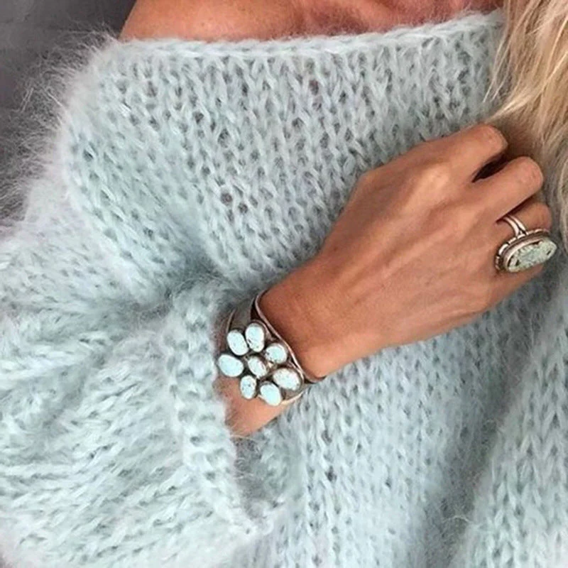 Belro stylish knitted sweater featuring a cozy, textured knit pattern, perfect for casual wear and winter warmth.