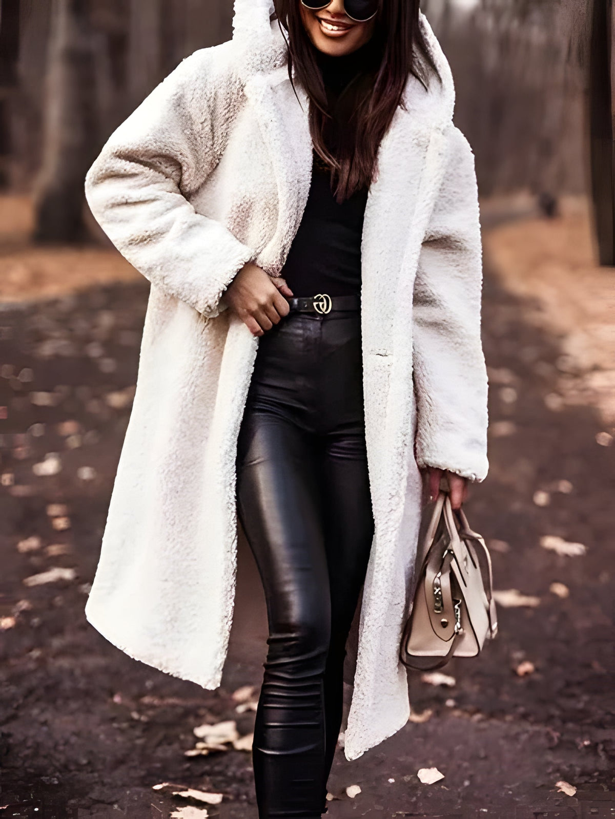 Belro winter coat displayed on a hanger, featuring a warm, stylish design with a zipper and cozy fabric for cold weather.