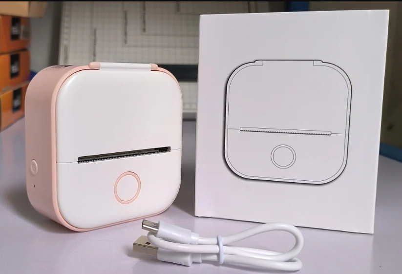 Belro portable mini thermal label printer for home use, showing printed labels and compact electronic design.