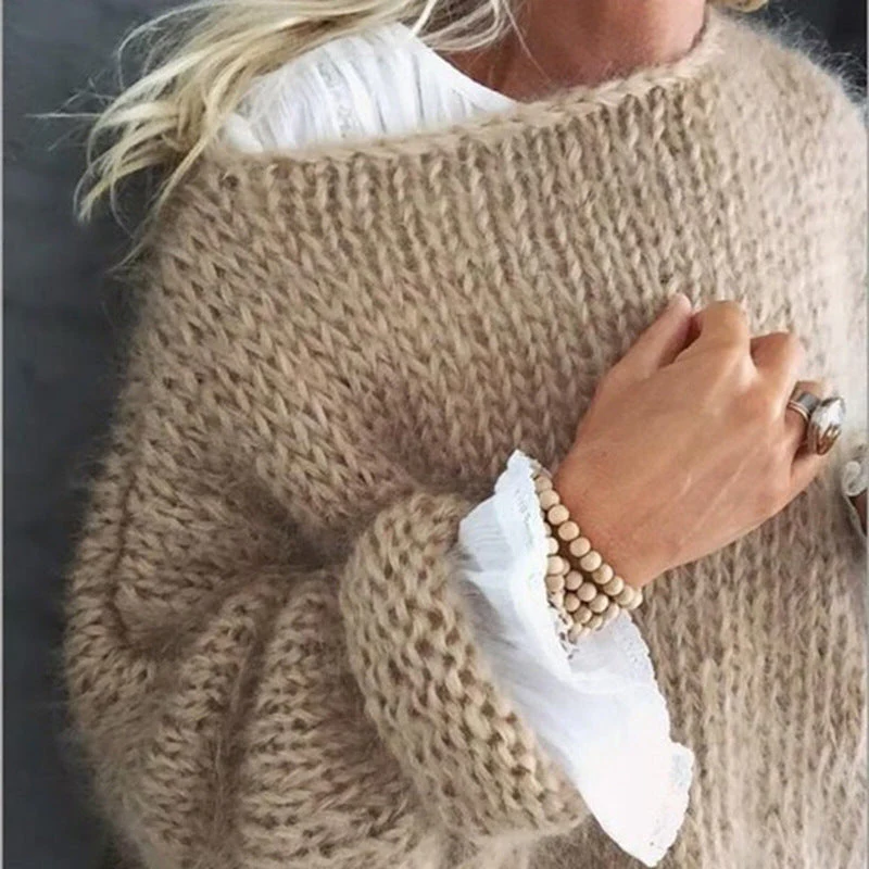 Belro stylish knitted sweater featuring a cozy, textured design in soft, neutral tones, perfect for casual wear.