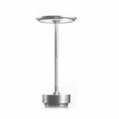Wireless Belro table lamp with a sleek modern design, emitting soft light for ambient lighting in a contemporary setting.