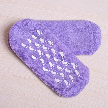 Belro moisturizing socks with spa gel lining for nourishing foot care, shown in a cozy setting with the socks partially on feet.