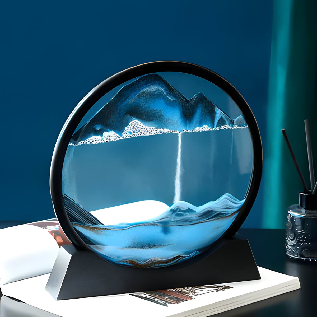 Belro Moving Sea Sand Art toy with colorful sand layers in a clear display frame, creating dynamic, artistic patterns.