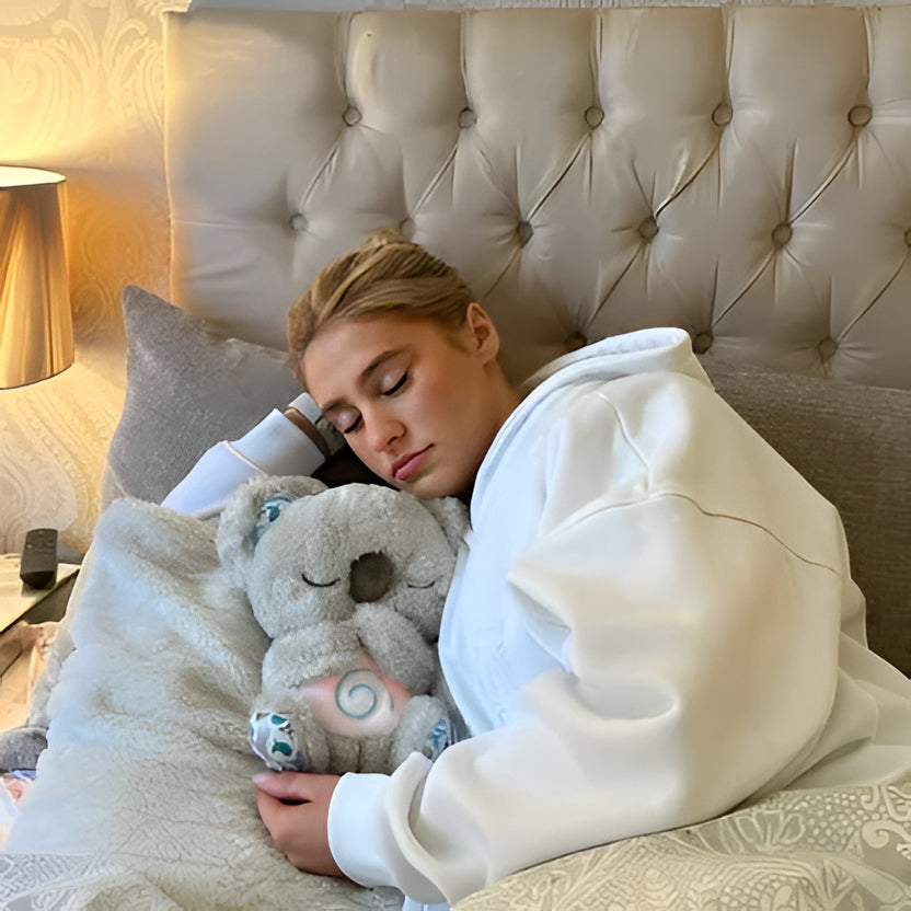Belro Anxiety Relief Koala plush toy with music, lights, and rhythmic breathing motion for calming and comfort.