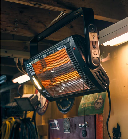 Belro outdoor electric wall-mounted infrared patio heater in a garden setting, designed for outdoor heating and comfort.
