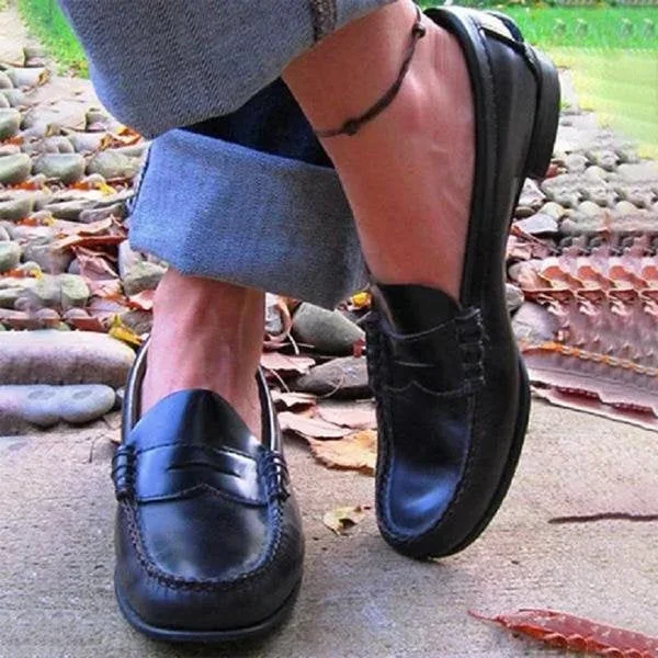 Women’s vintage slip-on loafers by Belro with low heels and PU leather upper, styled in a classic, casual footwear design.