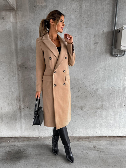Elegant Belro coat featuring a classic design, shown hanging with a tailored fit and smooth fabric for timeless style.