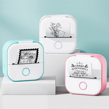 Belro portable mini thermal label printer for home use, showing printed labels on a clean surface.