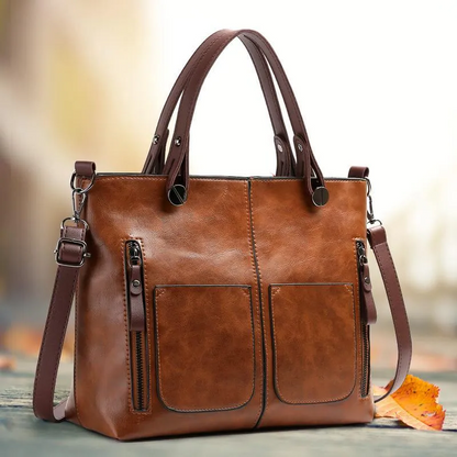 Elegant leather bag by Belro, showcasing a sleek accessory with detailed stitching and a polished finish.