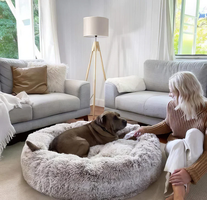 Belro calming dog bed with soft fabric and cushioned sides for comfortable pet relaxation.