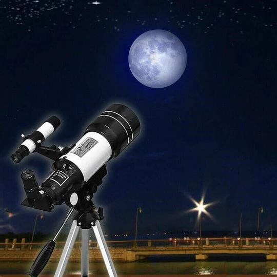 Belro professional astronomical telescope with tripod, moon-watching, 150x zoom, set on table for detailed night sky observation.