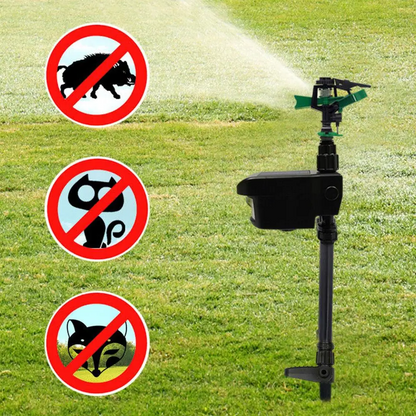 Belro motion-activated animal repellent sprinkler in a garden, with a sensor detecting movement to activate water spray.