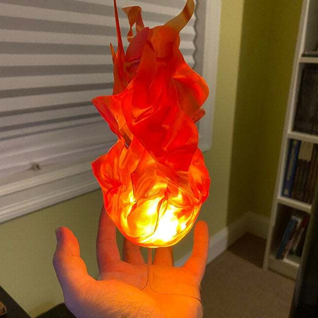 Belro Halloween floating fireball prop with glowing LED fireball ornament for outdoor home and garden decor.