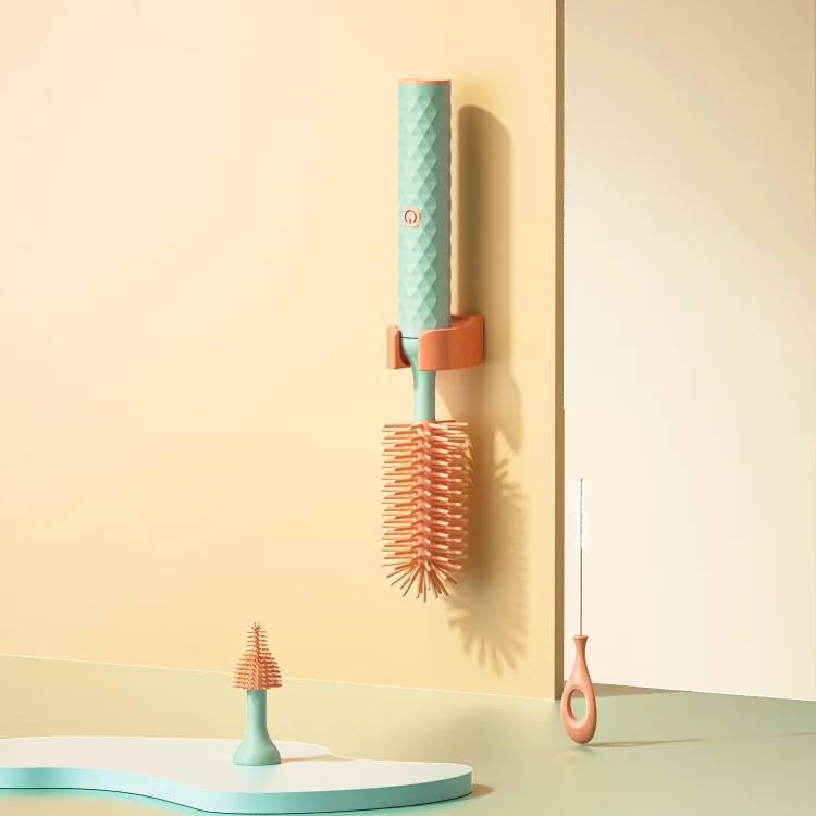Electric baby bottle brush by Belro with a compact design, featuring a handle and brush head for cleaning bottles.
