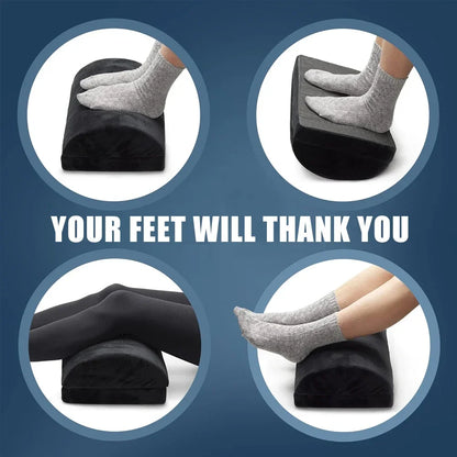 Belro under desk foot cushion rest on a desk, providing ergonomic support for improved comfort and posture while working.