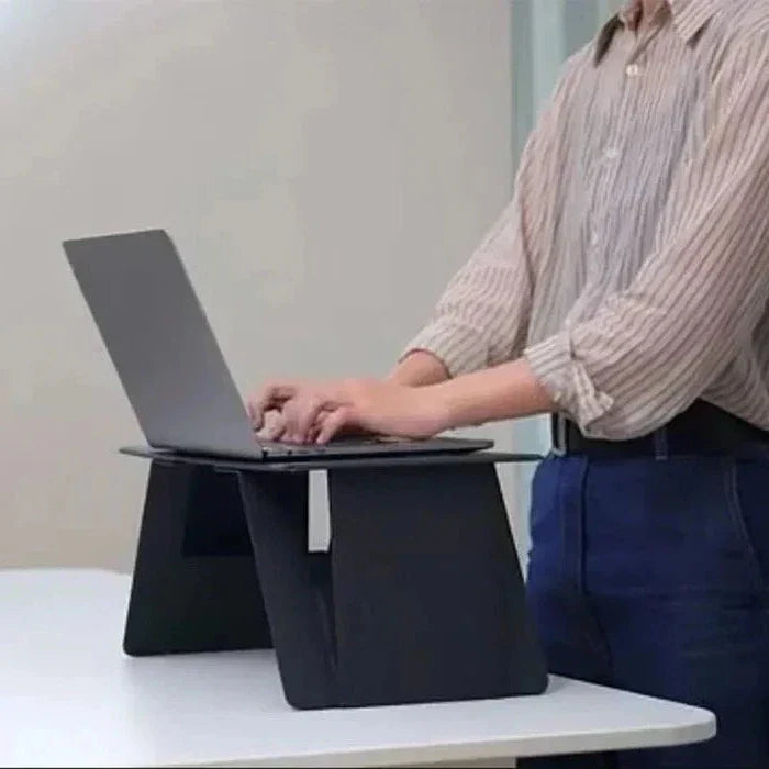 Belro portable laptop table, lightweight and paper-thin, ideal for study and reading, with a sleek design and smooth surface.