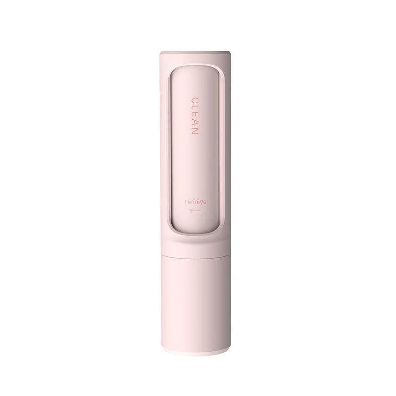 Pink reusable lint roller and pet hair remover brush from Belro, ideal for removing lint and pet hair from clothing and furniture.