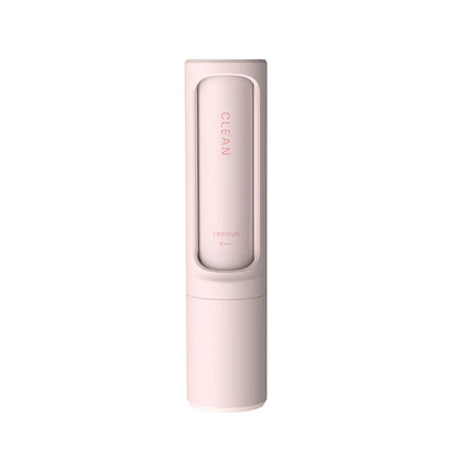 Pink reusable lint roller and pet hair remover brush from Belro, ideal for removing lint and pet hair from clothing and furniture.