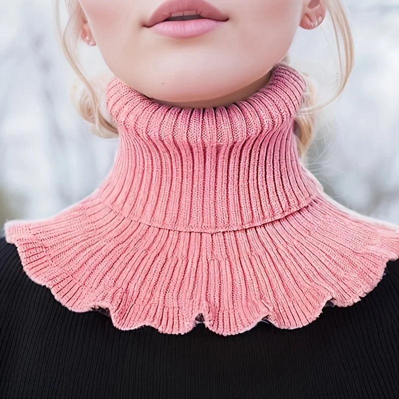 Pink knitted turtleneck scarf for women by Belro, cozy and stylish accessory with textured knit pattern.