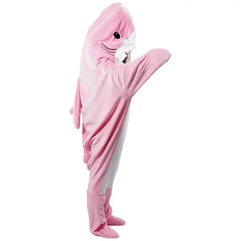 Pink Belro soft flannel shark hoodie blanket draped over a bed, showing its cozy shark design and plush material for sleepwear comfort.
