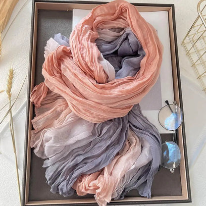 Pink soft gradient cotton shawl by Belro, cozy ladies winter scarf with a gentle color transition and lightweight fabric.