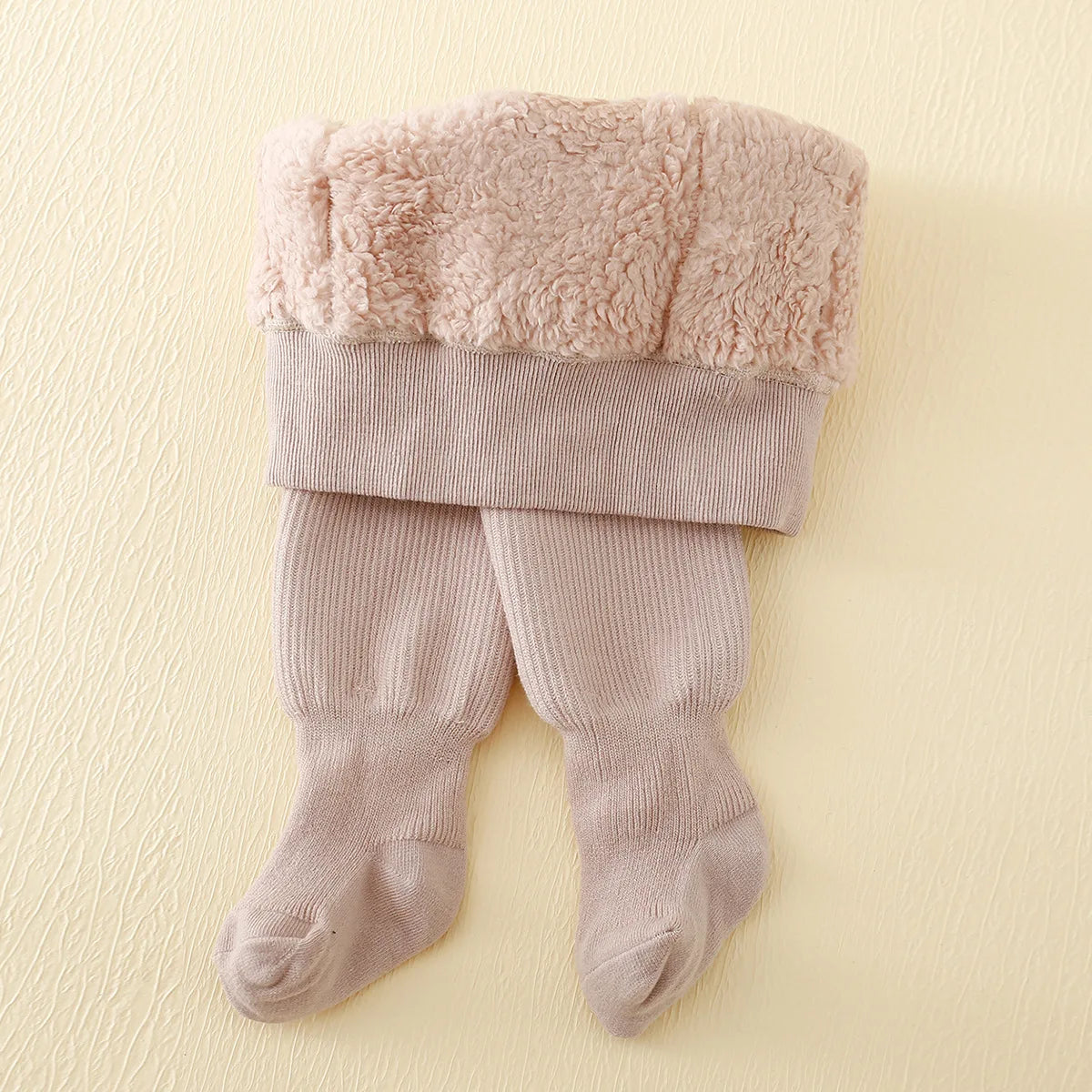 Pink kids winter fleece-lined leggings from Belro, cozy and warm clothing for children, featuring soft fleece interior and stretchy fabric.