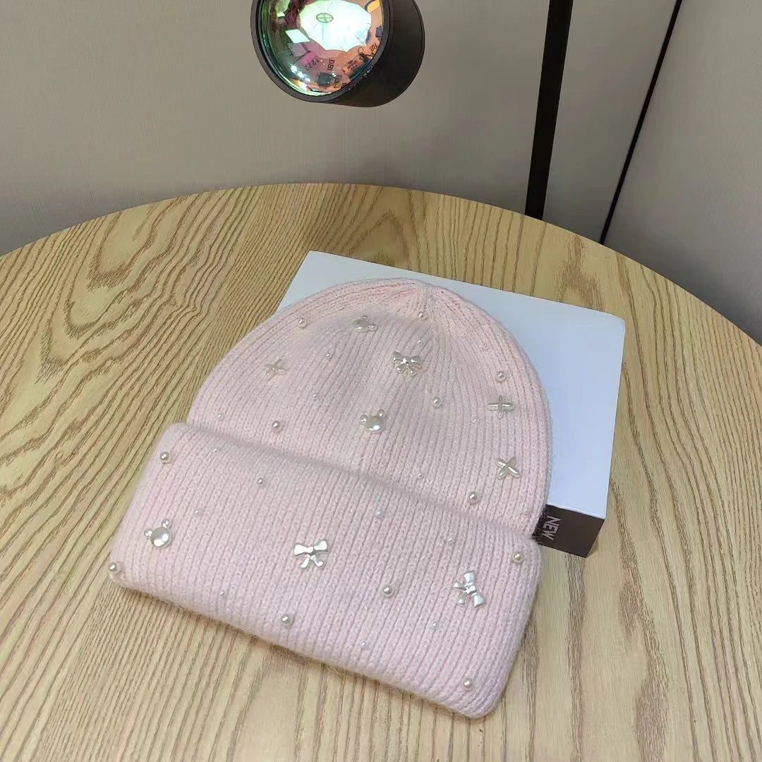 Pink Pearl Accent Knit Beanie Winter Hat by Belro featuring a cozy knit design and decorative pearl embellishments.