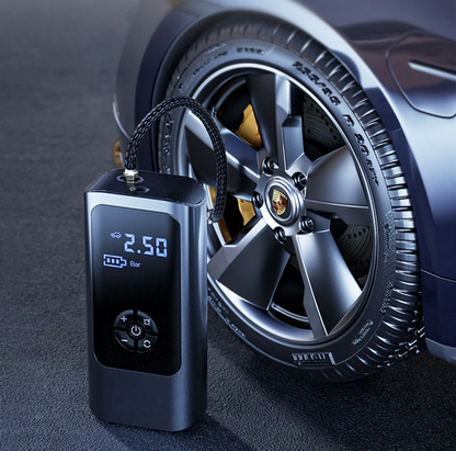 Portable 12V tire inflator compressor by Mivoza Deutschland with dual power for car and bicycle tires.