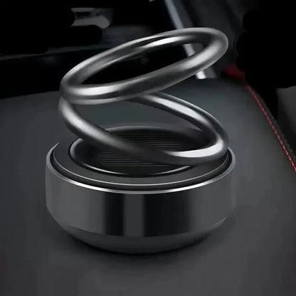 Belro portable kinetic molecular aromatherapy diffuser, rotating device for car, living room, or bathroom use.