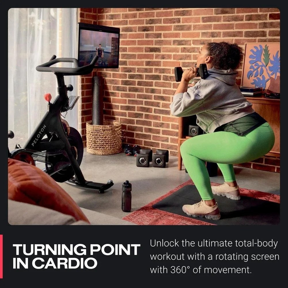 Casavibeo Peloton Bike+ indoor stationary exercise bike with 24-inch HD touchscreen and sleek design for home workouts.