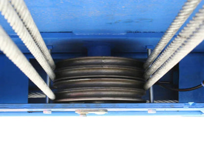 Casavibeo Atlas 412 12,000 lbs commercial 4-post lift shown with metal posts and lifting arms for vehicle maintenance.