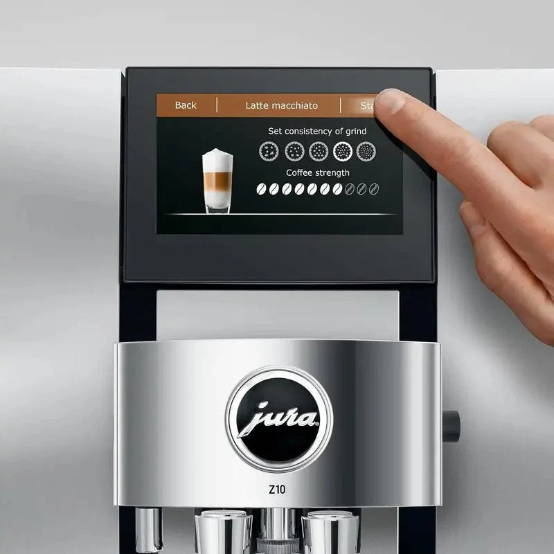 Casavibeo Jura Z10 automatic coffee machine with digital display and sleek black design for home barista use.