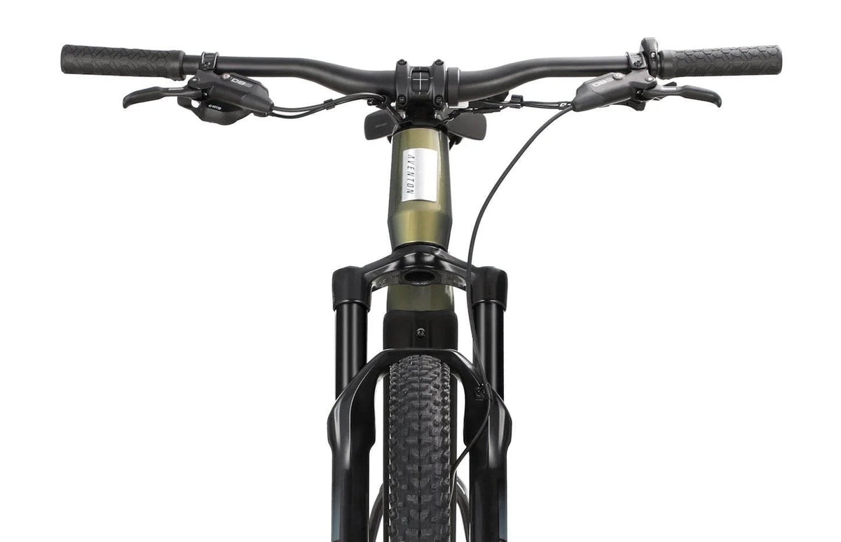 Aventon Ramblas eMTB bicycle with a sleek Borealis frame and modern design, shown in a scenic outdoor setting.