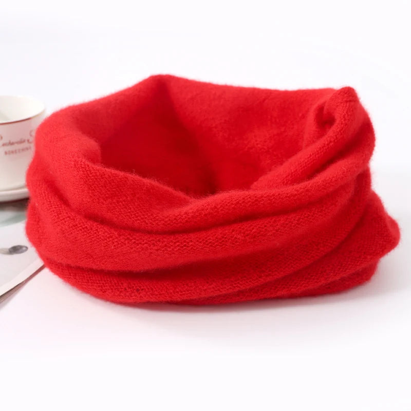 Red Merino wool face mask and winter scarf set by Belro, soft, warm clothing for cold weather with cozy knit texture.