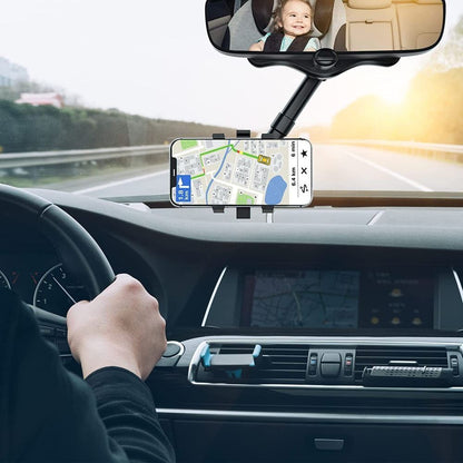 Belro universal car rearview mirror with built-in hands-free phone holder mounted on a vehicle's mirror.