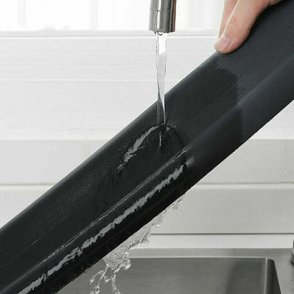 Belro garage door weather stripping seal strip installed at the bottom of a door for insulation and weatherproofing.