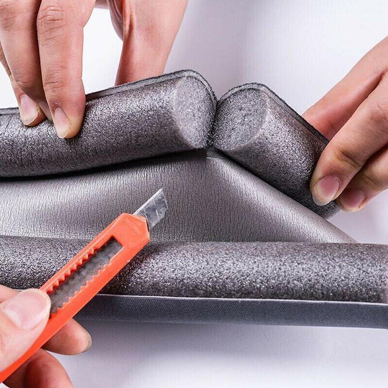 Belro garage door weather stripping seal strip at the bottom of a door, used for insulation and weatherproofing in tools and hardware.