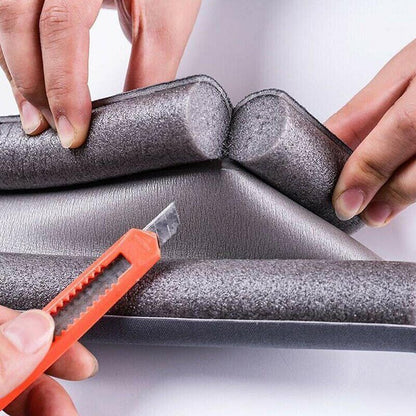 Belro garage door weather stripping seal strip at the bottom of a door, used for insulation and weatherproofing in tools and hardware.