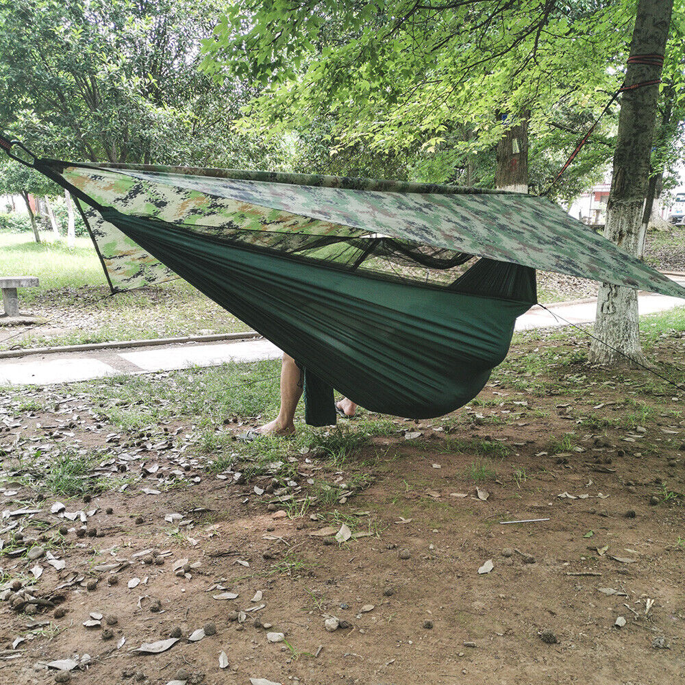 Belro outdoor two-person camping hammock with canopy, set up outdoors in a garden, ideal for relaxing and camping trips