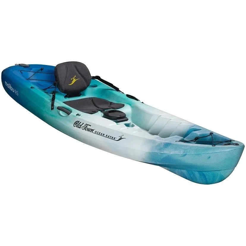 Casavibeo Ocean Kayaks Malibu 9.5 on water, featuring sleek design and comfortable seating for kayaking adventures.
