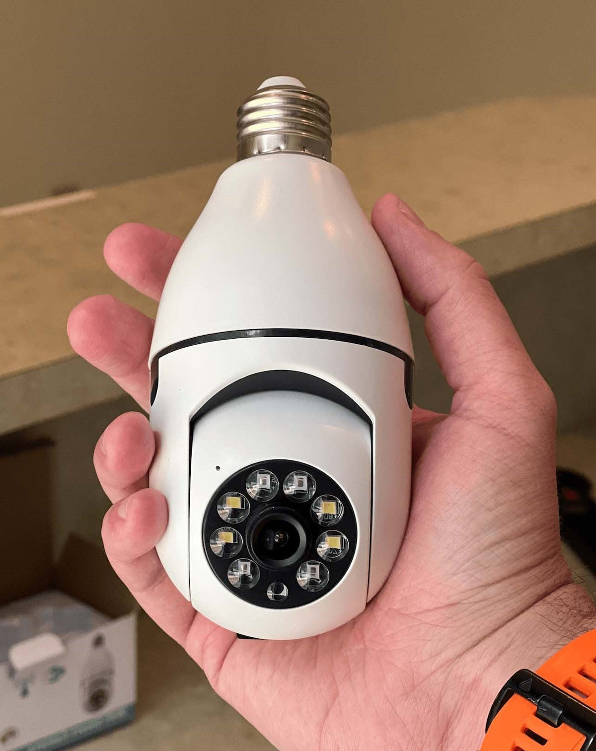 Belro outdoor security light bulb camera installed in a home, showing a sleek design for outdoor surveillance and security.