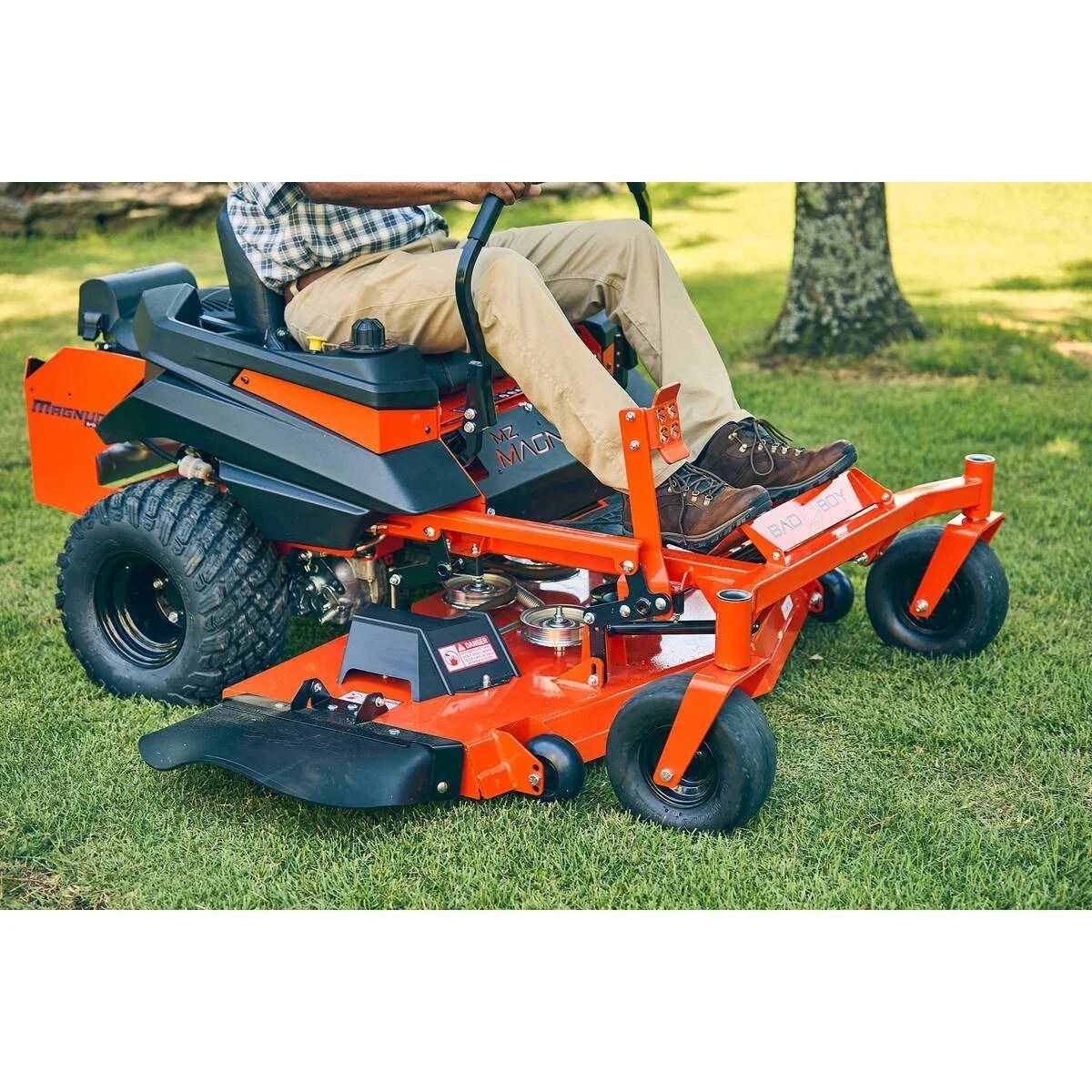 Casavibeo Bad Boy Magnum 54-inch zero-turn mower with 24 HP gas engine, shown with cutting deck and control panel.