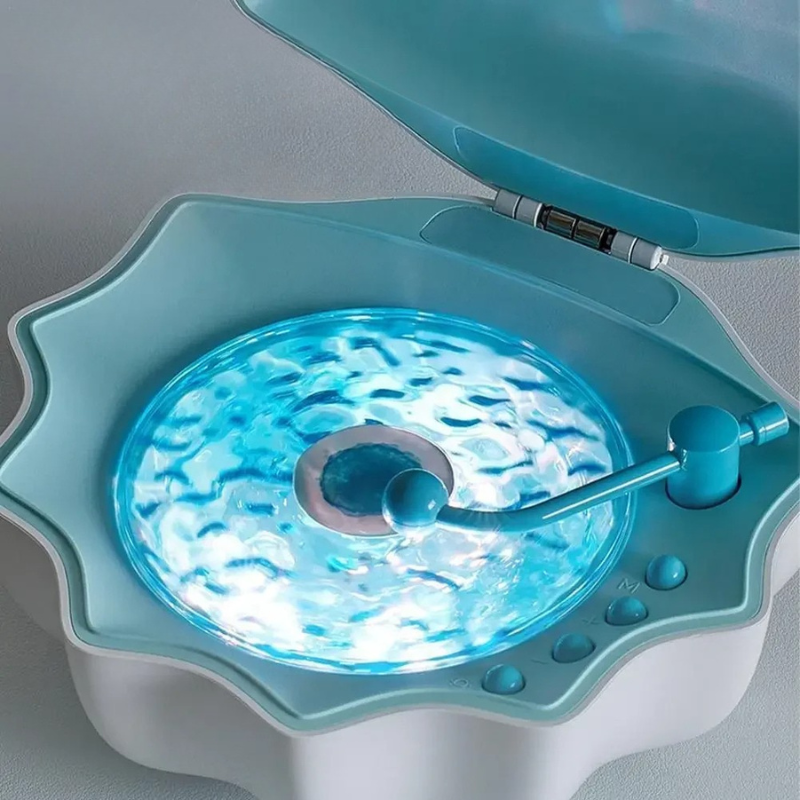 Belro Shell Bluetooth speaker with integrated night light, compact electronic device featuring a shell design and ambient lighting.