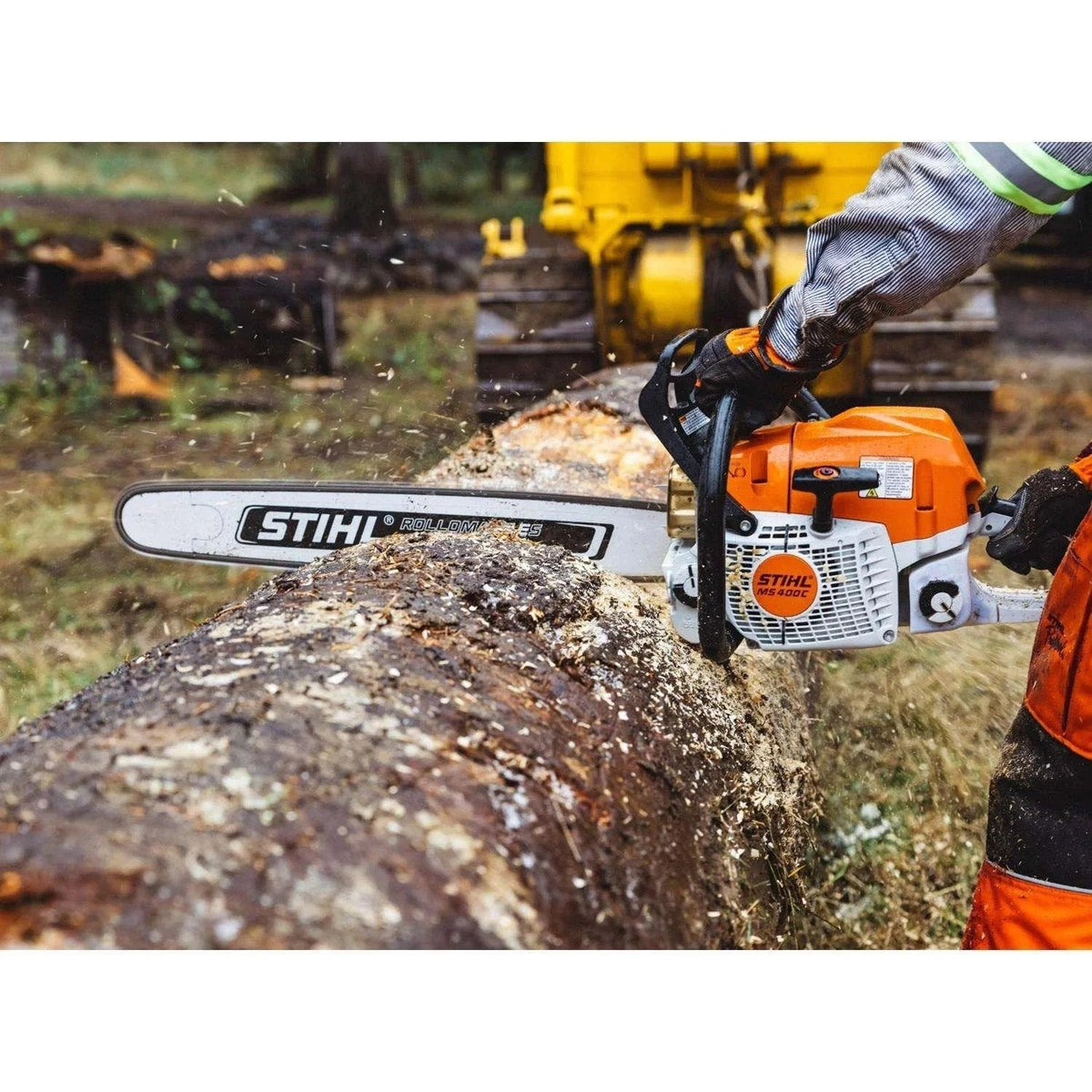Stihl MS 400 C-M gas chainsaw with a 16-inch bar and 66.8 cc engine, featuring a professional-grade design and ergonomic handle.