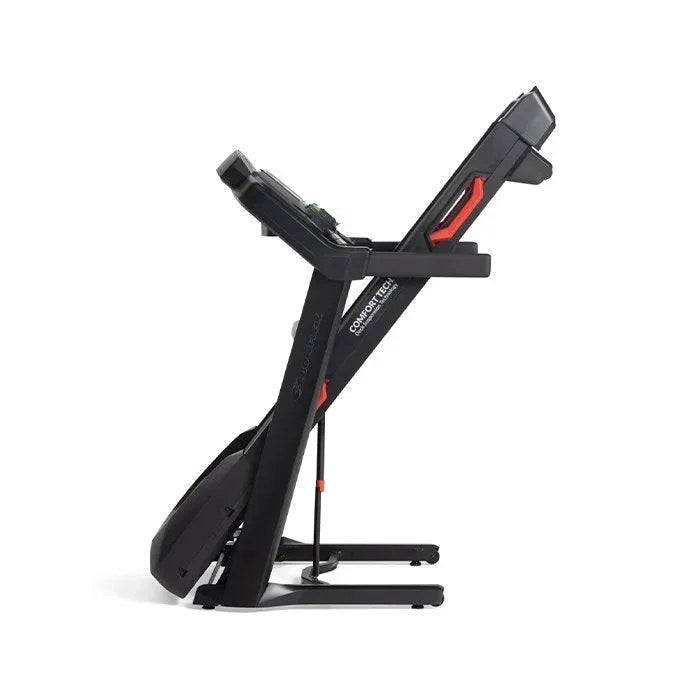 Casavibeo Bowflex BXT8J treadmill with digital display, running belt, and control panel in a home gym setting.