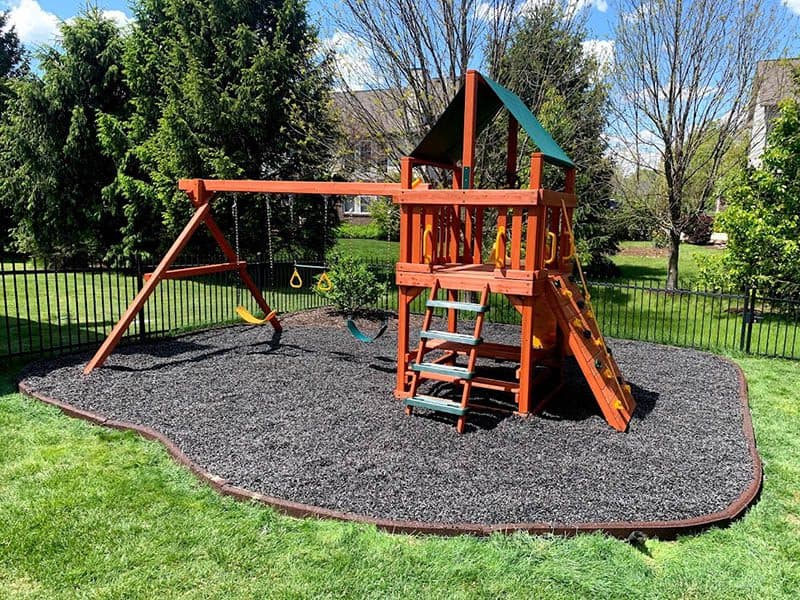 Casavibeo Woodplay Tiger Tower A wooden playset with a tiger-themed design, featuring a cedar wood structure for kids' outdoor play.