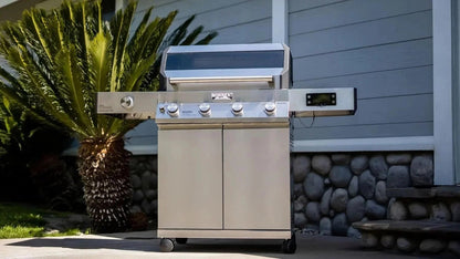 Casavibeo Monument Grills Eminence 405 propane gas grill with stainless steel body and cast iron cooking plate, ready for outdoor grilling.