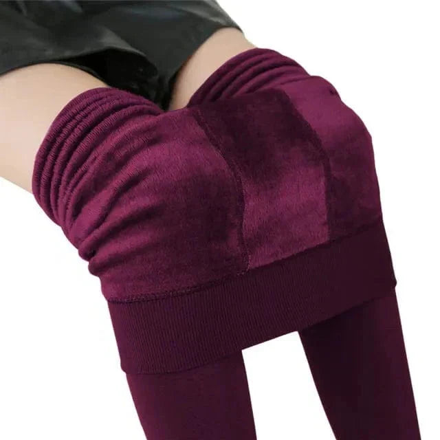 Belro fleece-lined leggings in deep wine color, showcasing their soft, cozy interior and snug fit for cold weather.