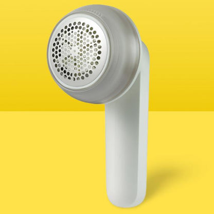 White rechargeable anti-pilling razor by Belro, designed for removing fuzz and pills from outdoor fabric and upholstery.